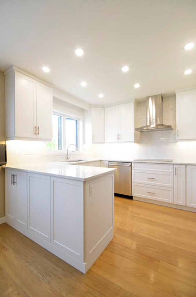 island kitchen stove Whole Home Renovation - Whole Home Renovations Winnipeg - Kitchen Renovations Winnipeg - All Canadian Renovations Ltd.